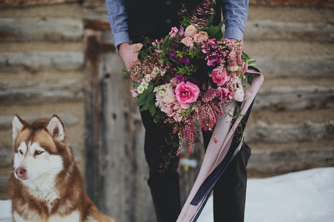 winter wedding, groom with bouquet